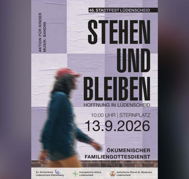 Auf dem Plakat sieht man eine Person, die geht. In großer Schrift steht auf dem Plakat "Stehen und Bleiben – Hoffnung für Lüdenscheid".